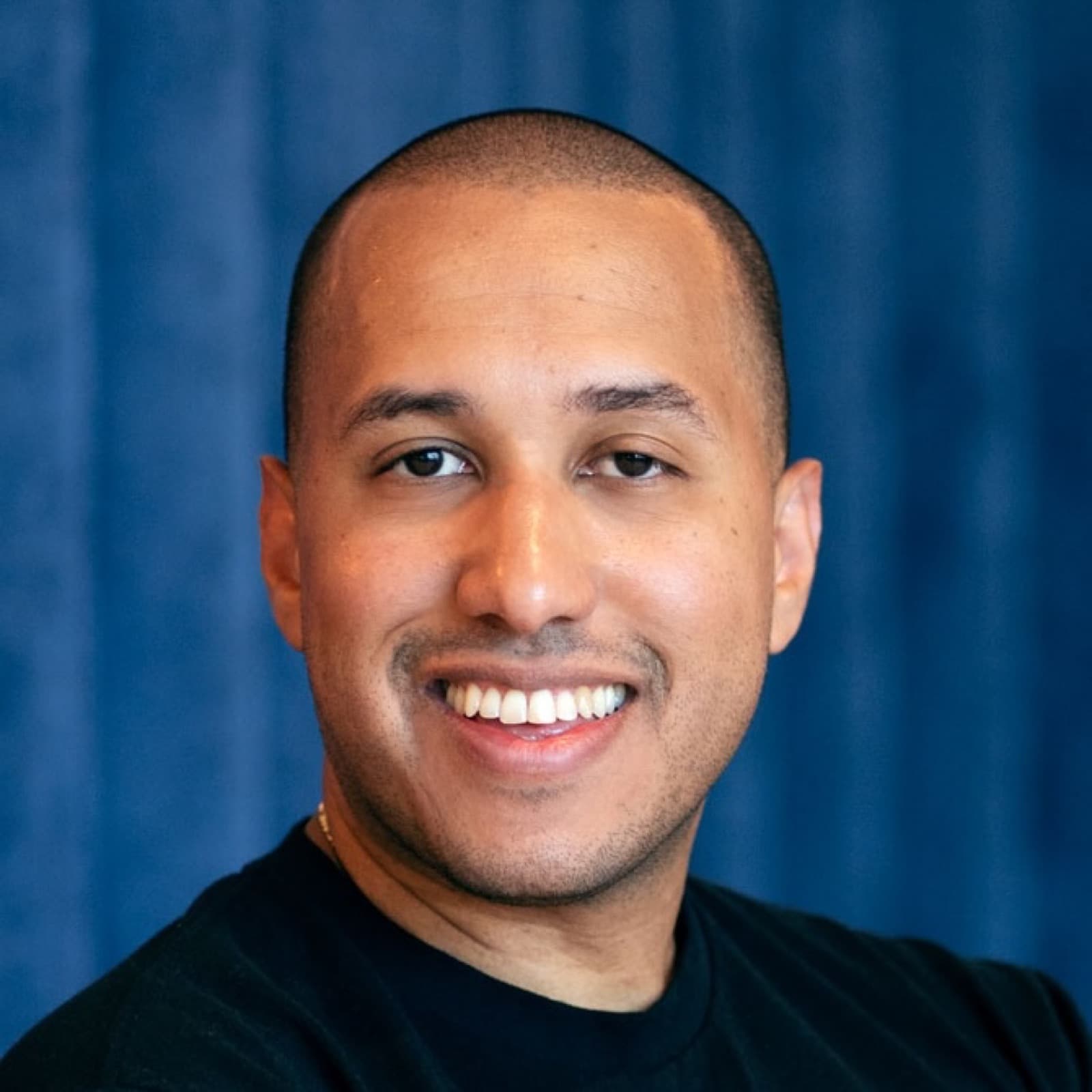 John, co-founder and host of Kenosis